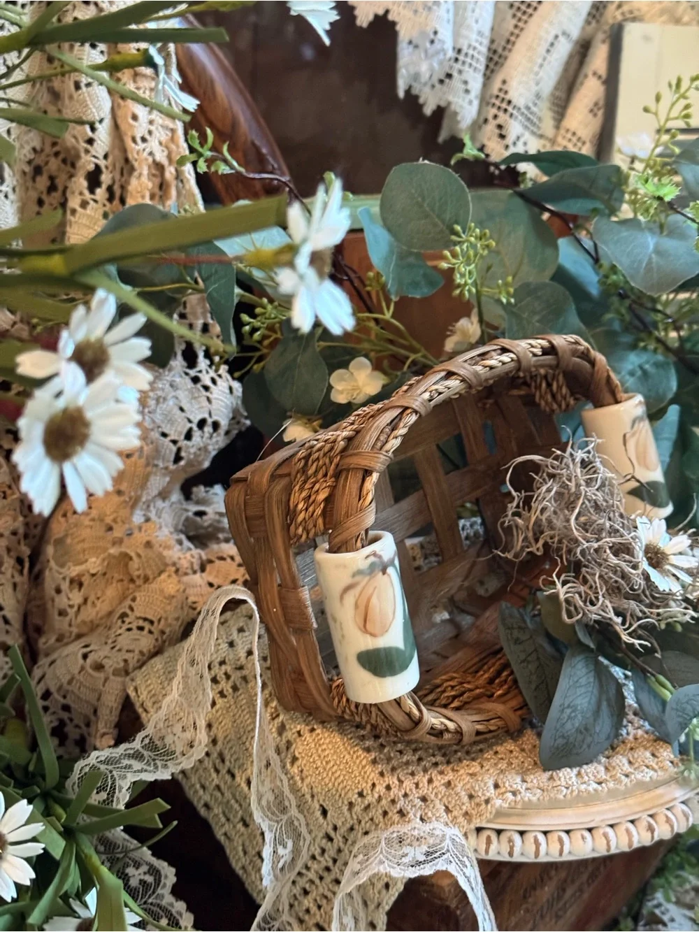 Vintage Brown Woven Basket with White Floral Accents